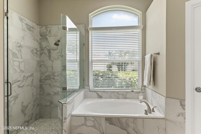 3820 Danforth Dr W, Jacksonville, FL 32224 - bathroom featuring a marble finish shower and a garden tub