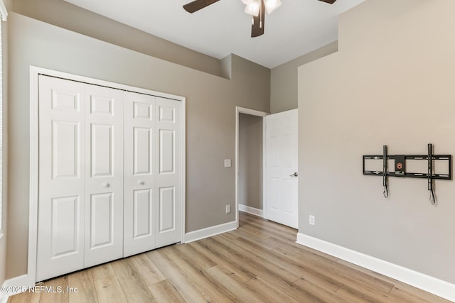 3820 Danforth Dr W, Jacksonville, FL 32224 - unfurnished bedroom with wood finished floors, baseboards, a closet, and ceiling fan