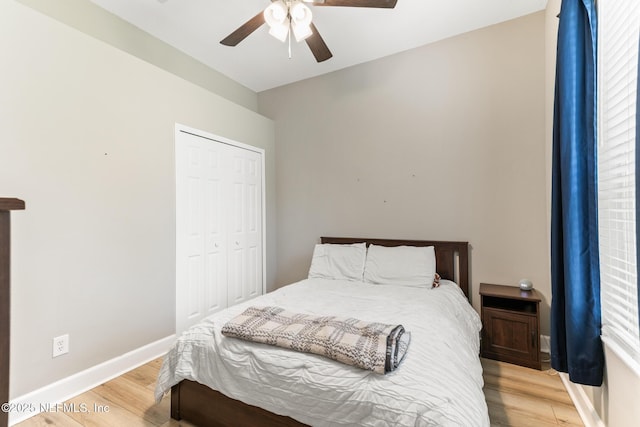 3820 Danforth Dr W, Jacksonville, FL 32224 - bedroom featuring light wood-style floors, a closet, a ceiling fan, and baseboards