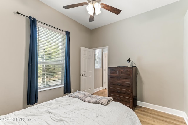 3820 Danforth Dr W, Jacksonville, FL 32224 - bedroom featuring light wood finished floors, baseboards, and a ceiling fan