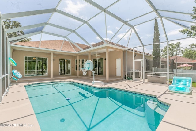 3820 Danforth Dr W, Jacksonville, FL 32224 - view of swimming pool featuring a ceiling fan, a patio, and a lanai