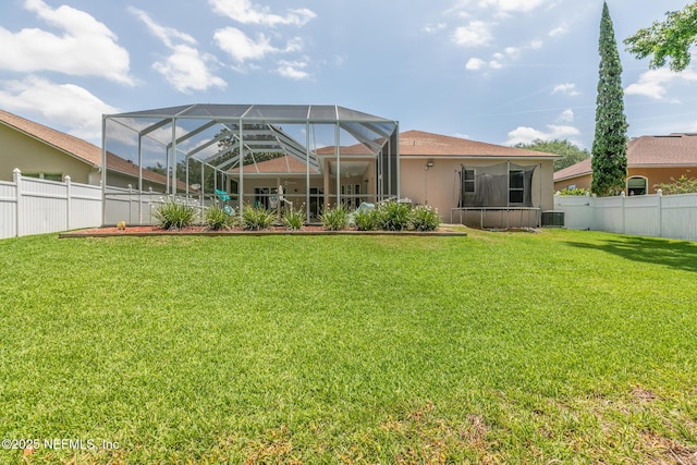 3820 Danforth Dr W, Jacksonville, FL 32224 - rear view of property with a lanai, cooling unit, and stucco siding