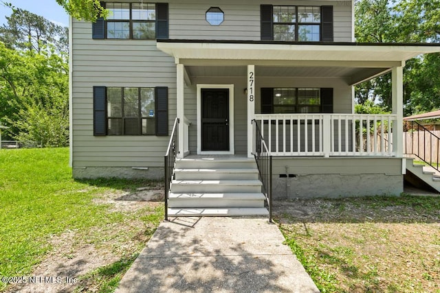 2718 Parkrus Ln, Jacksonville, FL 32208 - view of front of property with covered porch and a front lawn