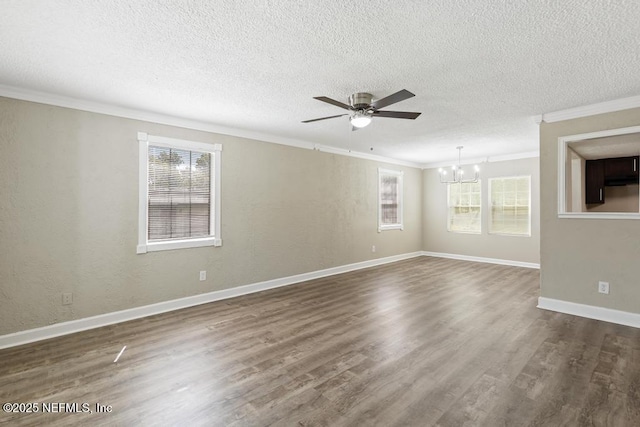2718 Parkrus Ln, Jacksonville, FL 32208 - unfurnished living room featuring crown molding, a chandelier, a ceiling fan, a textured ceiling, and dark wood-style floors
