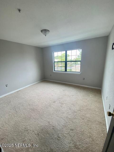 425 Timberwalk Ct Unit 1135, Ponte Vedra Beach, FL 32082 - carpeted spare room with a pendent fire sprinkler and baseboards
