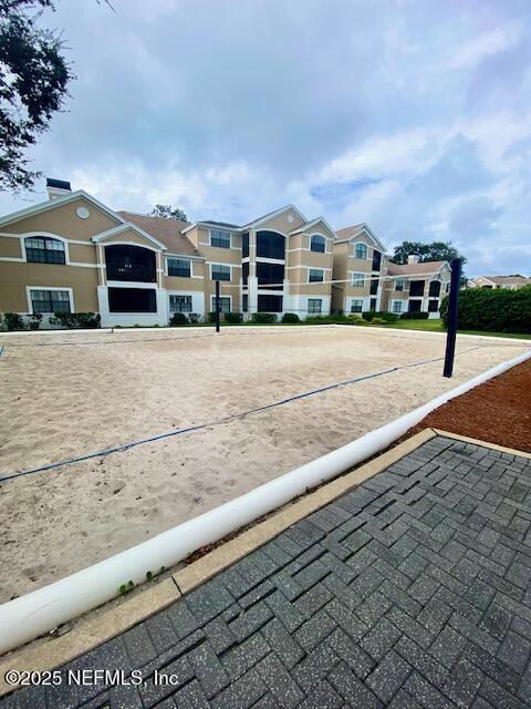 425 Timberwalk Ct Unit 1135, Ponte Vedra Beach, FL 32082 - view of community featuring volleyball court