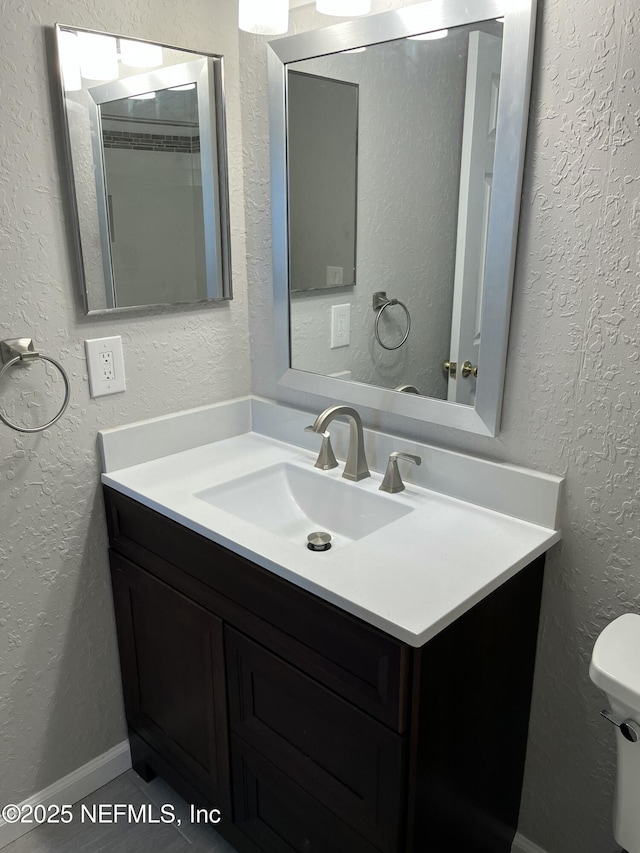 425 Timberwalk Ct Unit 1135, Ponte Vedra Beach, FL 32082 - bathroom with vanity, toilet, and a textured wall