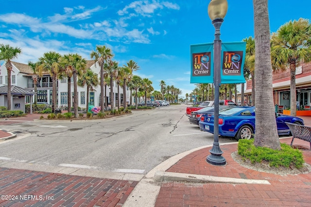 901 Ocean Blvd Unit 98, Atlantic Beach, FL 32233 - view of asphalt road featuring street lights, sidewalks, and curbs