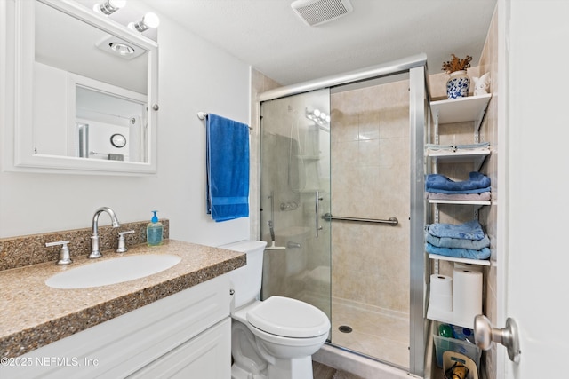 2327 Costa Verde Blvd Unit 201, Jacksonville Beach, FL 32250 - bathroom with a shower stall, vanity, and toilet