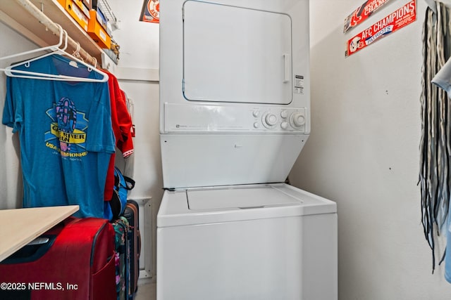 2327 Costa Verde Blvd Unit 201, Jacksonville Beach, FL 32250 - washroom featuring stacked washing machine and dryer