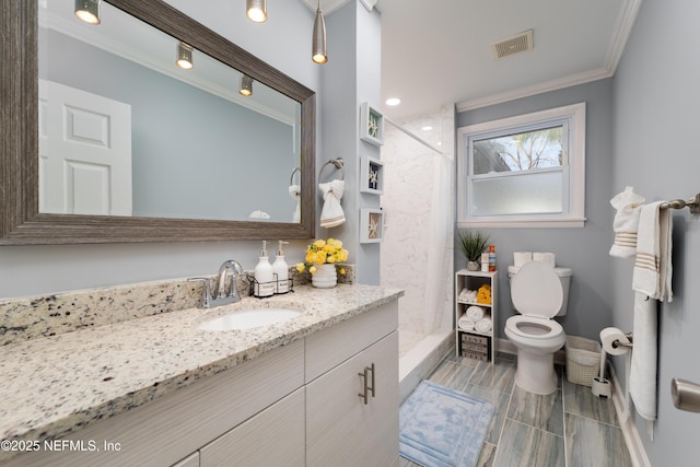 5253 Royce Ave, Jacksonville, FL 32205 - bathroom featuring ornamental molding, toilet, and vanity