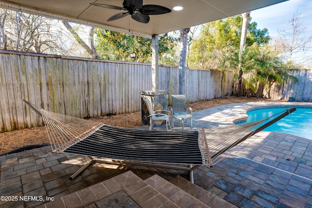 5253 Royce Ave, Jacksonville, FL 32205 - fenced backyard featuring ceiling fan and a patio