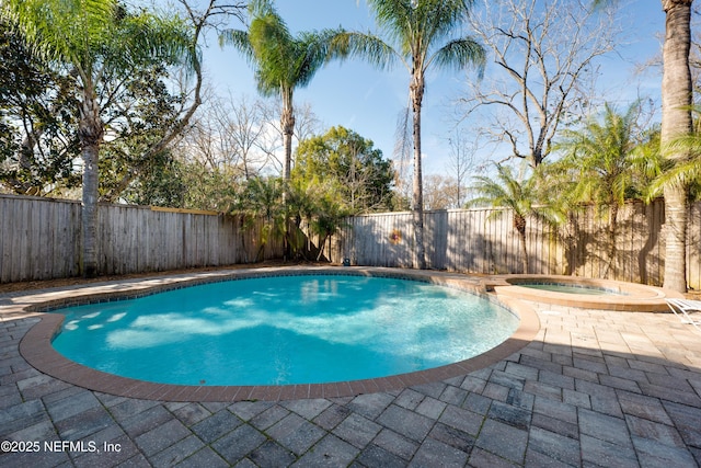 5253 Royce Ave, Jacksonville, FL 32205 - view of swimming pool with an in-ground hot tub, a fenced backyard, and a patio
