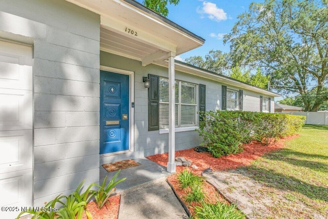 1702 Dibble Cir E, Jacksonville, FL 32246 - entrance to property featuring a lawn