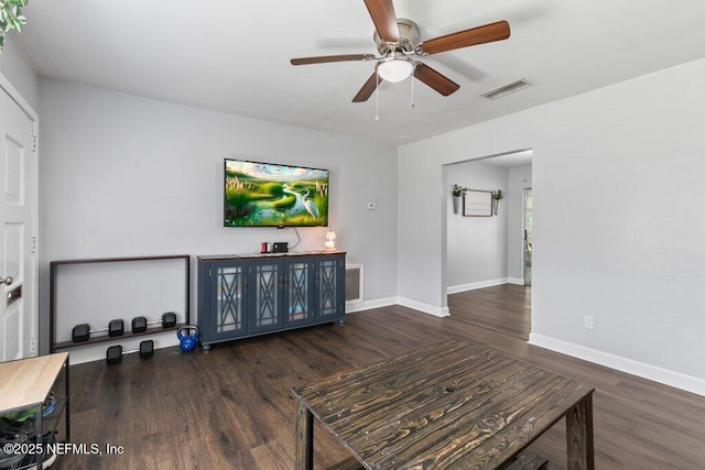 1702 Dibble Cir E, Jacksonville, FL 32246 - unfurnished living room featuring wood finished floors, ceiling fan, and baseboards