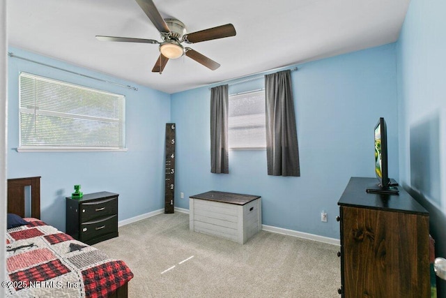 1702 Dibble Cir E, Jacksonville, FL 32246 - bedroom with carpet flooring, baseboards, and ceiling fan