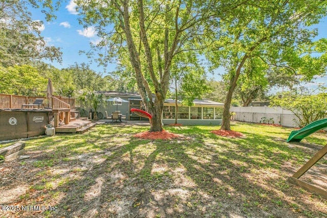 1702 Dibble Cir E, Jacksonville, FL 32246 - view of yard with a wooden deck