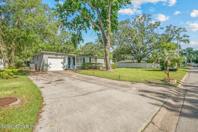 1702 Dibble Cir E, Jacksonville, FL 32246 - view of front facade featuring an attached garage and driveway