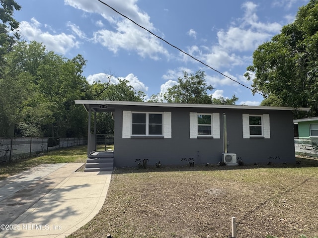 3114 Breve Dr, Jacksonville, FL 32209 - view of home's exterior with a cooling unit and concrete block siding