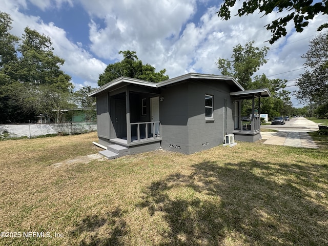 3114 Breve Dr, Jacksonville, FL 32209 - back of house with concrete block siding