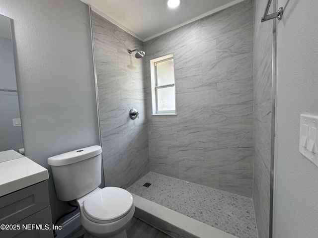 3114 Breve Dr, Jacksonville, FL 32209 - full bath with vanity, tiled shower, toilet, and crown molding