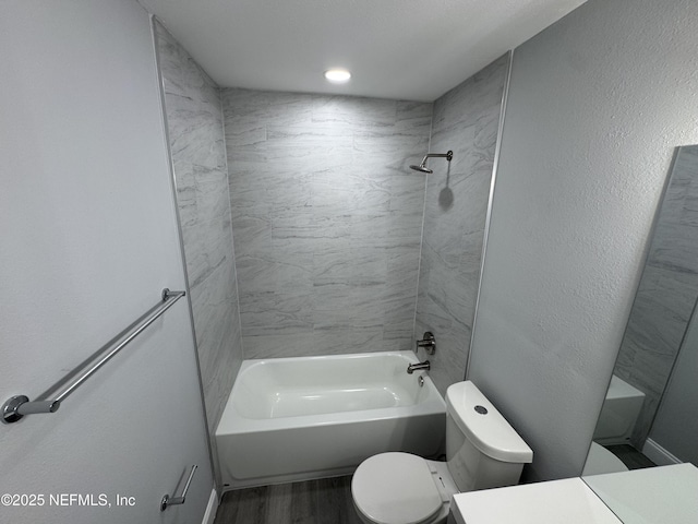 3114 Breve Dr, Jacksonville, FL 32209 - full bathroom with toilet, wood finished floors, vanity, and shower / washtub combination