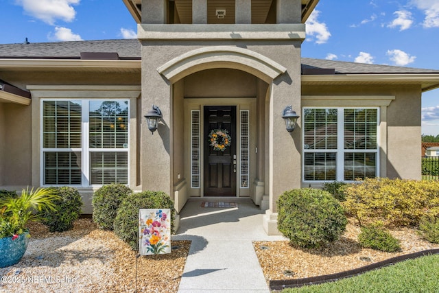 32479 Willow Parke Cir, Fernandina Beach, FL 32034 - view of exterior entry featuring stucco siding