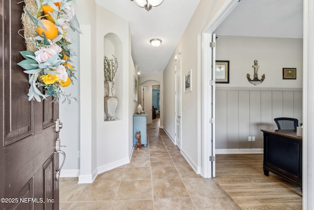 32479 Willow Parke Cir, Fernandina Beach, FL 32034 - foyer with arched walkways and light tile patterned floors