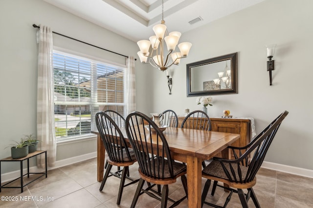 32479 Willow Parke Cir, Fernandina Beach, FL 32034 - dining room with a chandelier, light tile patterned floors, and baseboards