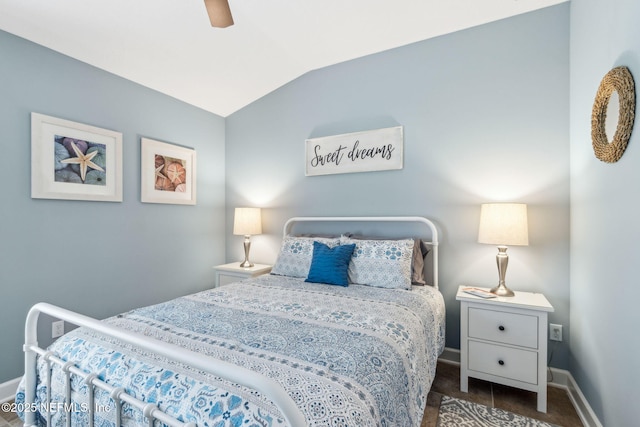 32479 Willow Parke Cir, Fernandina Beach, FL 32034 - bedroom featuring baseboards, vaulted ceiling, ceiling fan, and carpet flooring