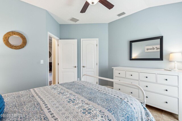 32479 Willow Parke Cir, Fernandina Beach, FL 32034 - tiled bedroom featuring ceiling fan