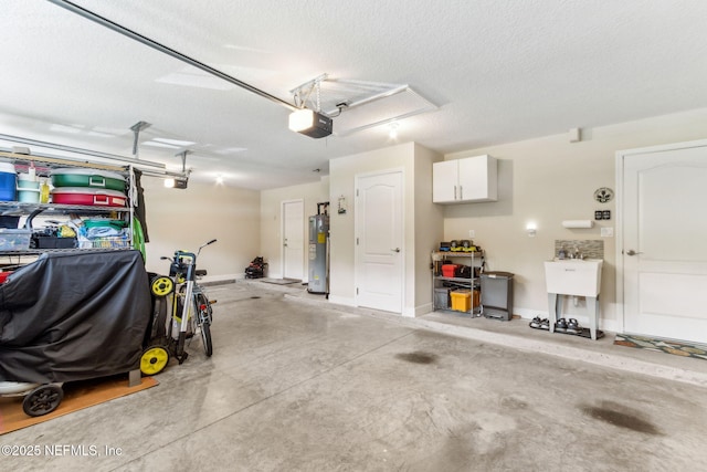 32479 Willow Parke Cir, Fernandina Beach, FL 32034 - garage featuring water heater, a garage door opener, and baseboards