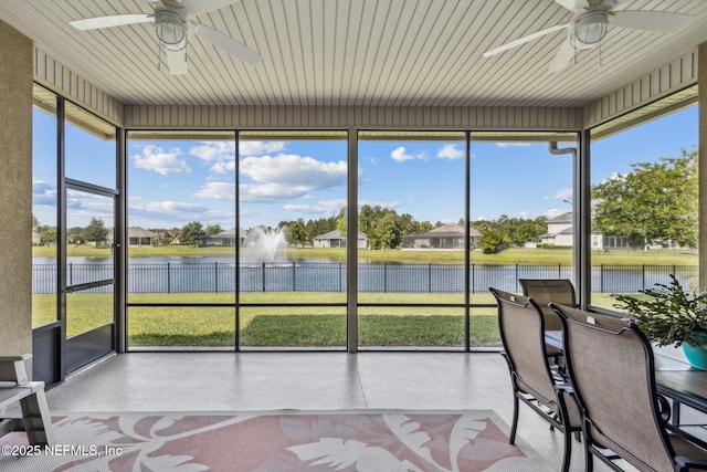 32479 Willow Parke Cir, Fernandina Beach, FL 32034 - sunroom featuring a ceiling fan and a water view