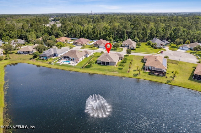 32479 Willow Parke Cir, Fernandina Beach, FL 32034 - aerial view of residential area featuring a heavily wooded area and a large body of water