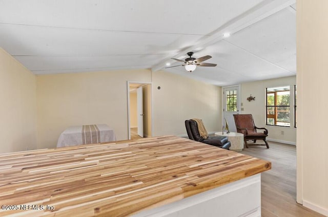 2022 Guava Ln, Bunnell, FL 32110 - dining space with light wood finished floors, ceiling fan, and baseboards