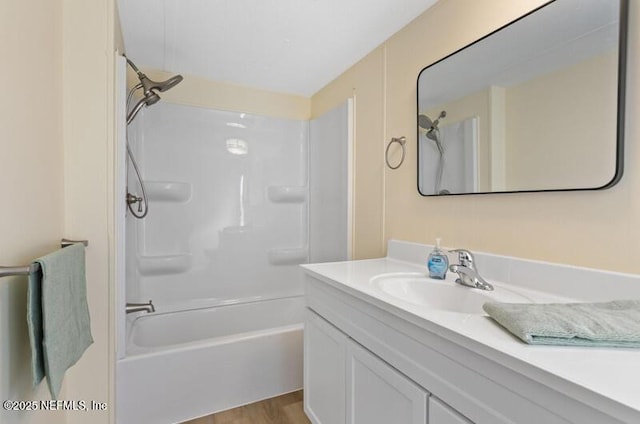 2022 Guava Ln, Bunnell, FL 32110 - bathroom with vanity, shower / washtub combination, and wood finished floors