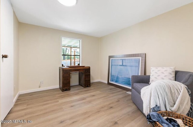 2022 Guava Ln, Bunnell, FL 32110 - sitting room featuring light wood-style floors and baseboards