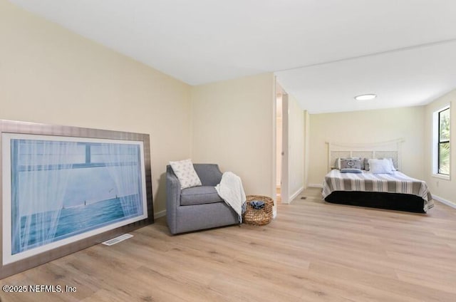 2022 Guava Ln, Bunnell, FL 32110 - bedroom featuring wood finished floors and baseboards