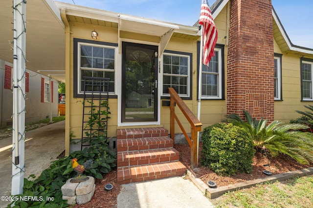 5372 Colonial Ave, Jacksonville, FL 32210 - property entrance featuring a chimney