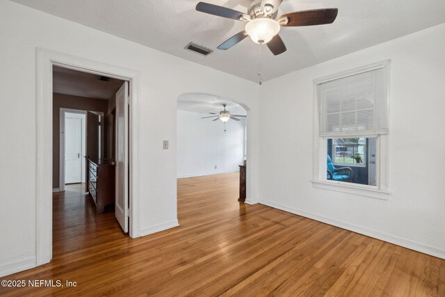 5372 Colonial Ave, Jacksonville, FL 32210 - unfurnished room with a ceiling fan, light wood-type flooring, and baseboards
