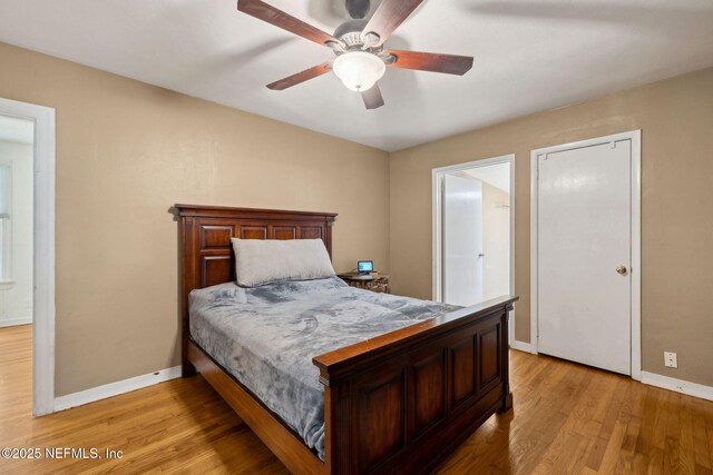 5372 Colonial Ave, Jacksonville, FL 32210 - bedroom featuring baseboards, light wood-style flooring, and ceiling fan