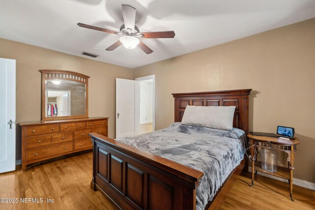 5372 Colonial Ave, Jacksonville, FL 32210 - bedroom featuring light wood-style flooring, ceiling fan, and baseboards