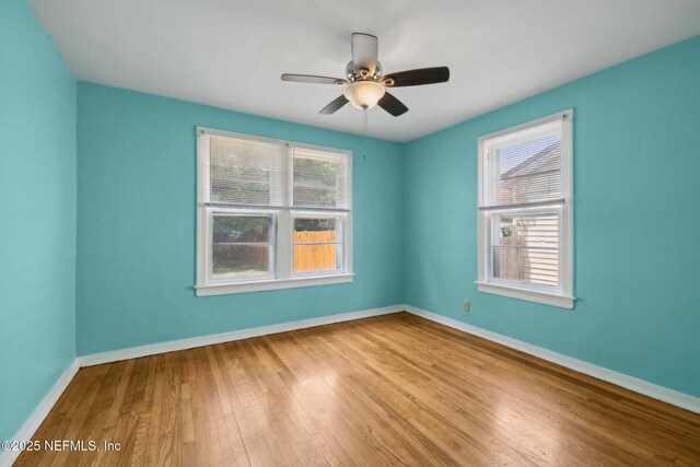 5372 Colonial Ave, Jacksonville, FL 32210 - empty room featuring hardwood / wood-style flooring, baseboards, and ceiling fan