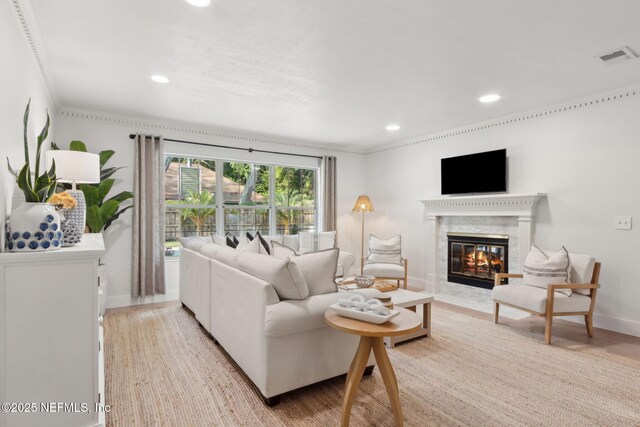 1908 Springbrook Rd, Fernandina Beach, FL 32034 - living room featuring baseboards, a high end fireplace, recessed lighting, and ornamental molding