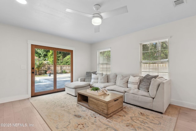 1908 Springbrook Rd, Fernandina Beach, FL 32034 - living room featuring wood finished floors, ceiling fan, and baseboards