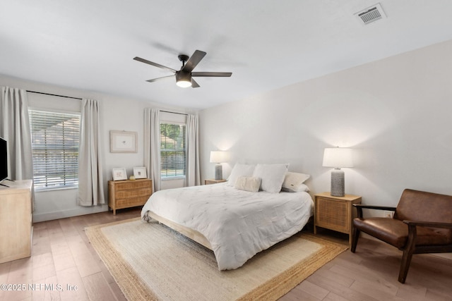 1908 Springbrook Rd, Fernandina Beach, FL 32034 - bedroom featuring light wood-style flooring, ceiling fan, and baseboards