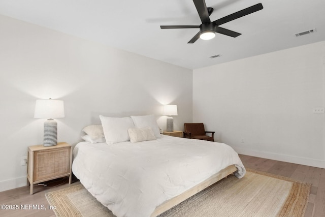 1908 Springbrook Rd, Fernandina Beach, FL 32034 - bedroom featuring wood finished floors, baseboards, and a ceiling fan