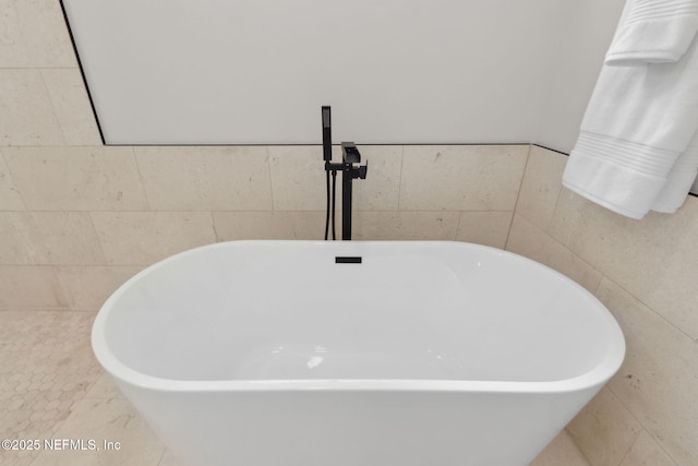 1908 Springbrook Rd, Fernandina Beach, FL 32034 - bathroom view of a soaking tub and tile walls