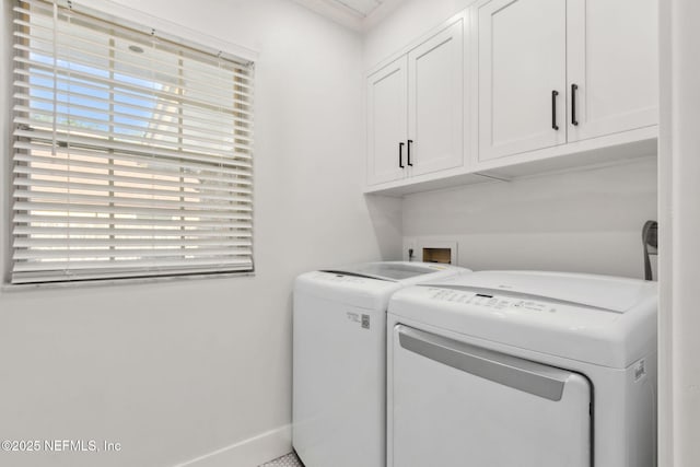 1908 Springbrook Rd, Fernandina Beach, FL 32034 - laundry room with cabinet space, washing machine and dryer, and baseboards
