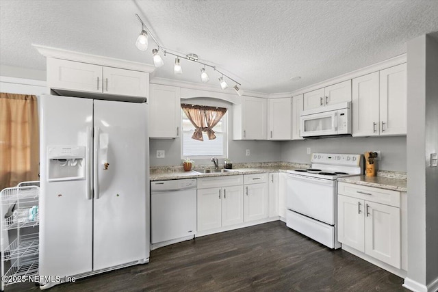 222 Acme St, Jacksonville, FL 32211 - kitchen featuring white appliances, a sink, a textured ceiling, dark wood finished floors, and white cabinets